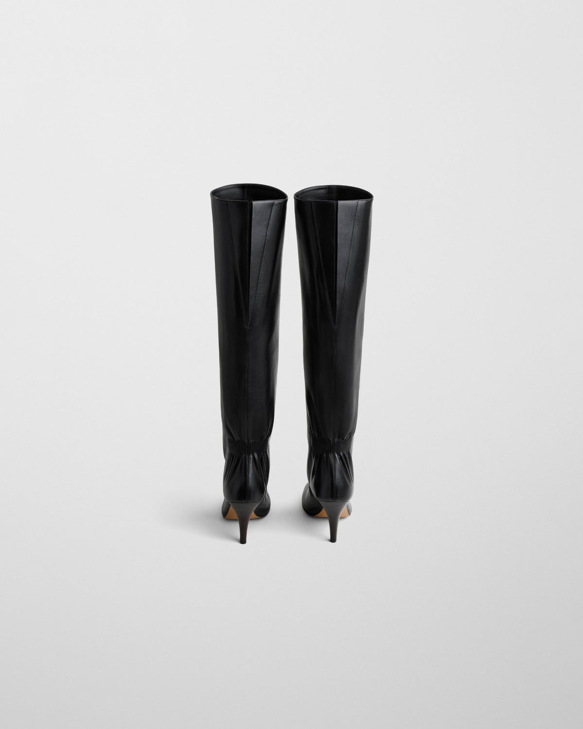 Back view of SLOUCHY HIGH BOOT in black leather
