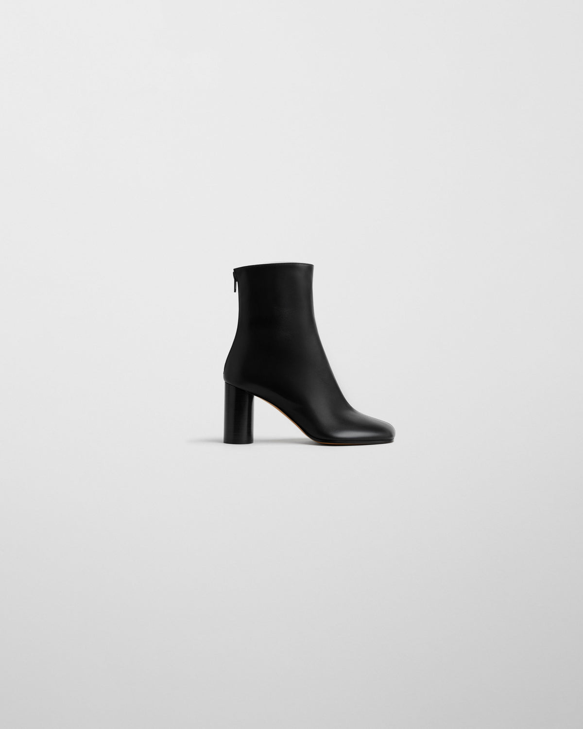 Side view of TUG BOOT in black leather
