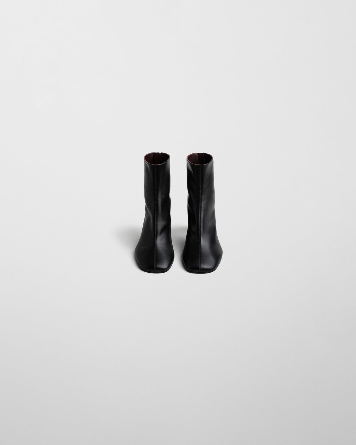 Front view of TUG ANKLE BOOT in black leather