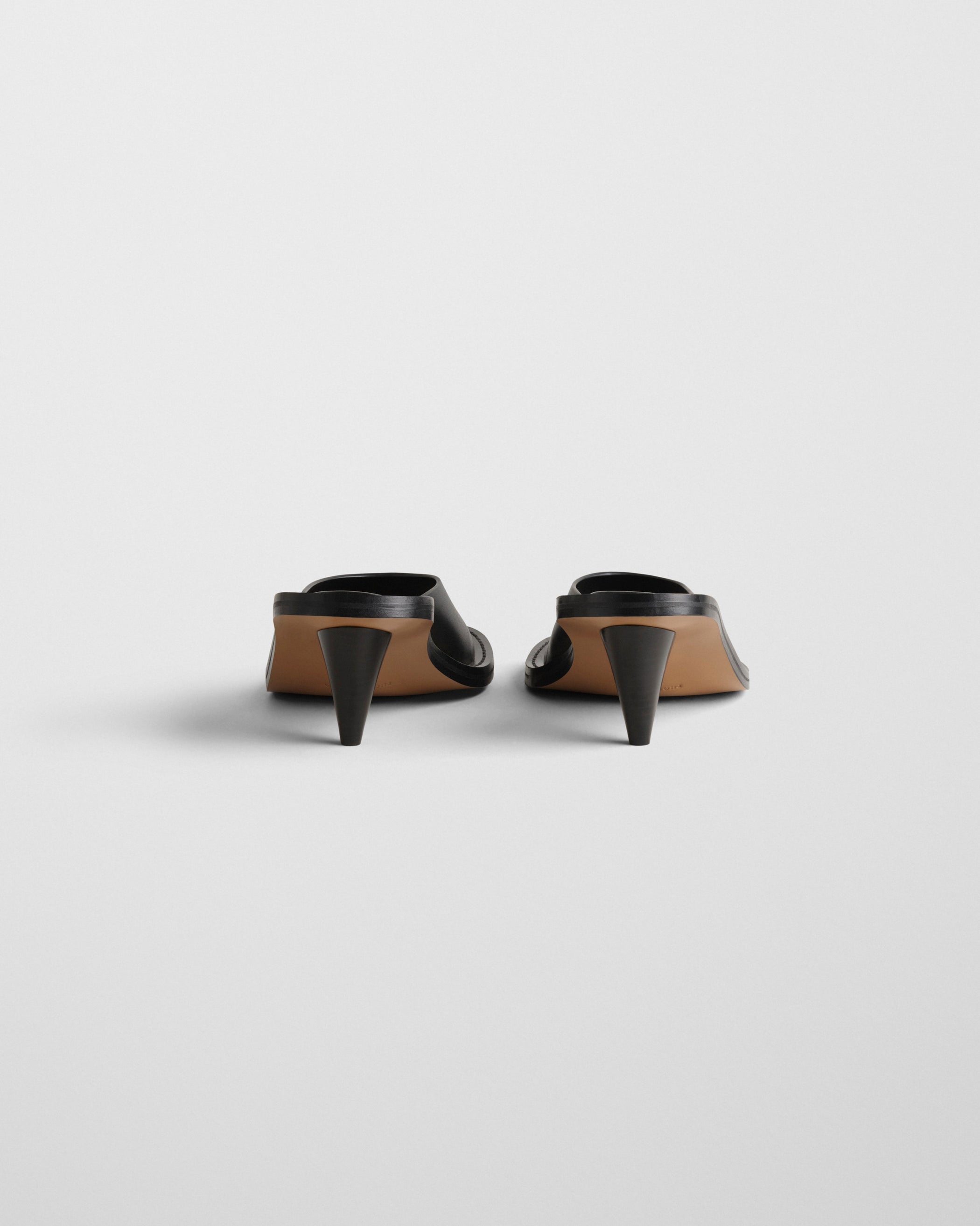 Flat back image of STRAP MULE in black leather