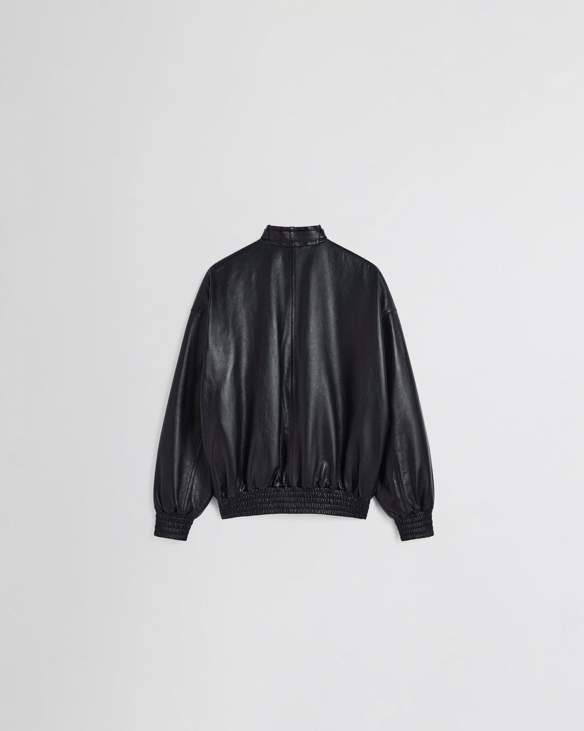 Back view of Front view of model wearing CLASSIC BOMBER in black ink