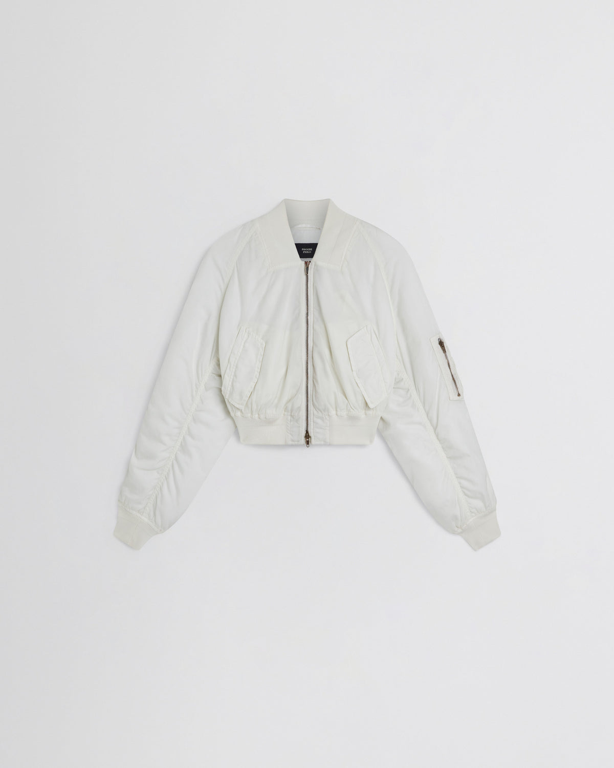 Flat front view of WASHED BOMBER in plaster white nylon