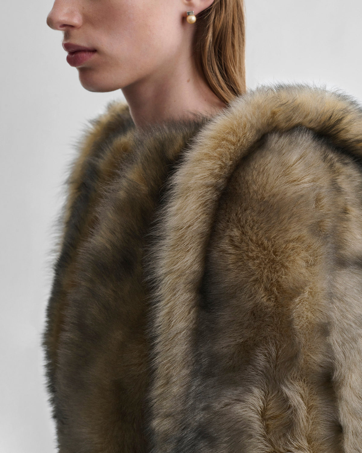 Detail view of model wearing DANCER JACKET in blue apricot shearling